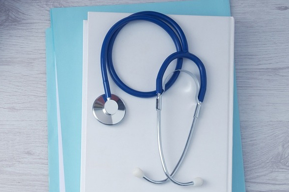 Stethoscope and notepad